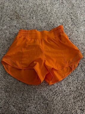 lululemon  Bright Orange Short size 4, high rise, 2.5 inch